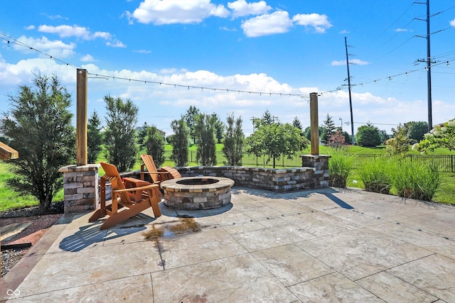 view of patio / terrace with a fire pit