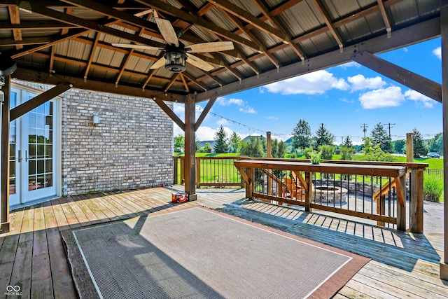 deck with a gazebo and ceiling fan