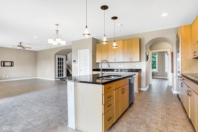 kitchen featuring sink, hanging light fixtures, dishwasher, and ceiling fan