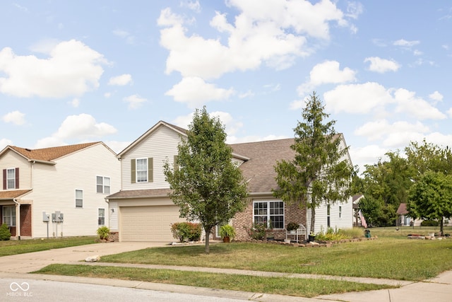 view of front facade with brick siding, a shingled roof, a front lawn, a garage, and driveway