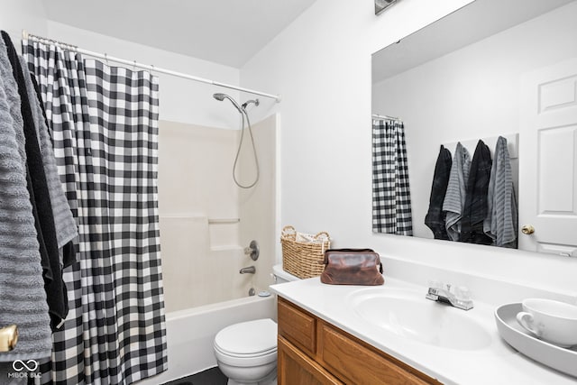 full bath featuring toilet, shower / bath combo, and vanity