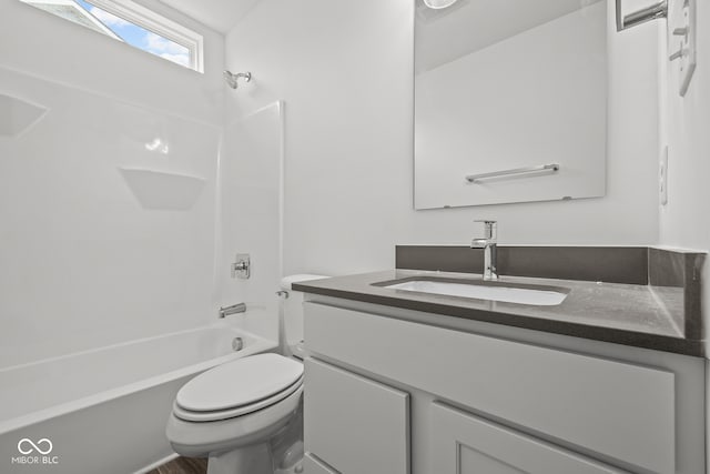 full bathroom featuring vanity, toilet, and shower / bath combination