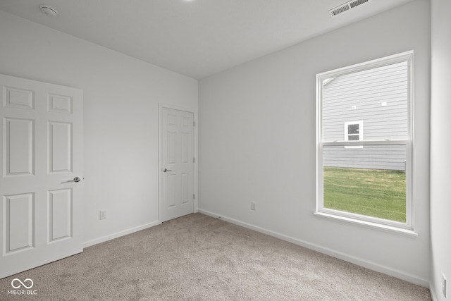 view of carpeted spare room