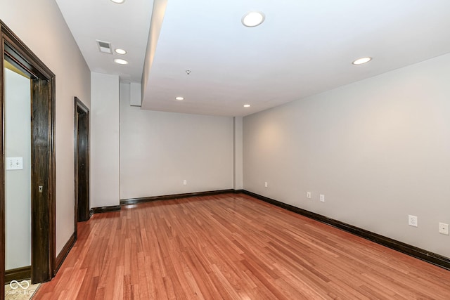 unfurnished room featuring light hardwood / wood-style floors