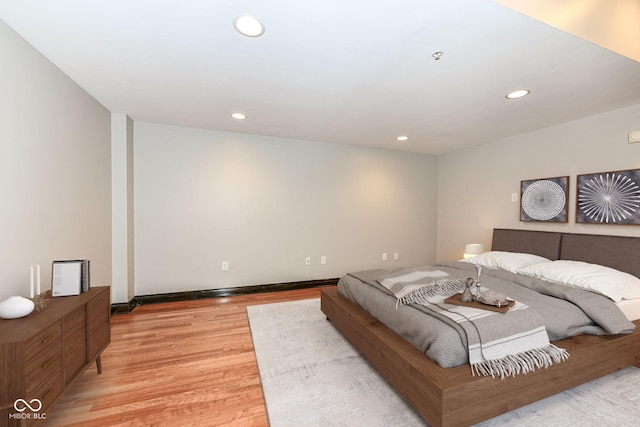 bedroom with light wood-type flooring