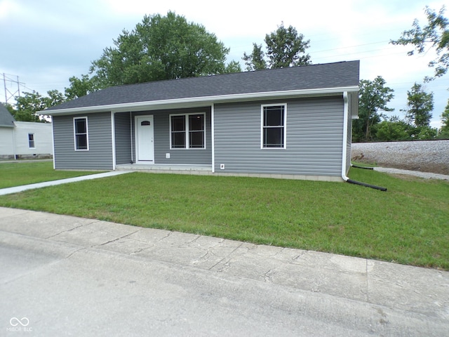 ranch-style home with a front yard