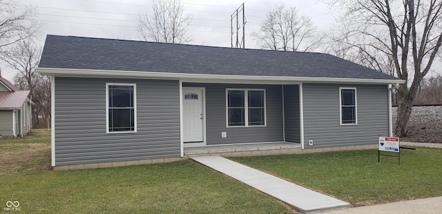 view of front of house featuring a front lawn