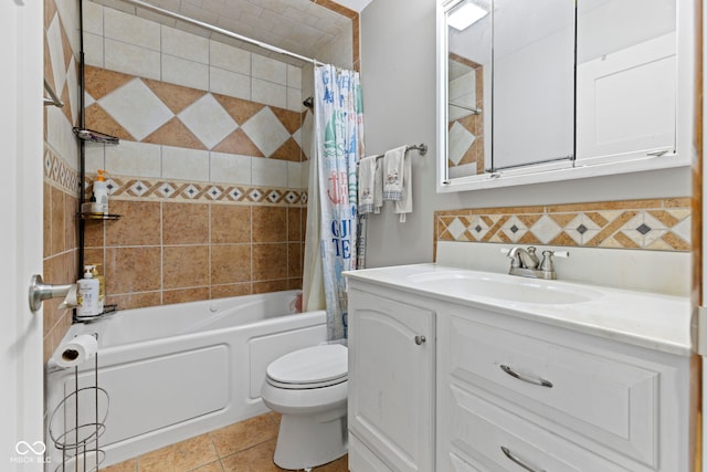 full bathroom featuring shower / bath combo, toilet, tile patterned floors, vanity, and backsplash