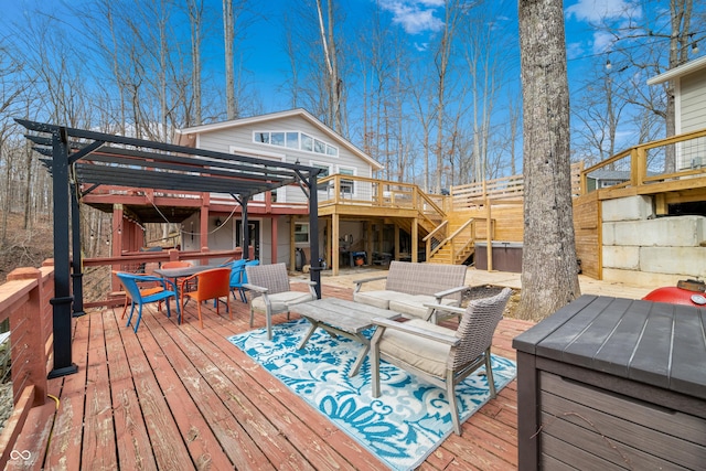 wooden terrace featuring stairs, an outdoor hangout area, and outdoor dining area