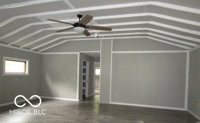 spare room featuring lofted ceiling, hardwood / wood-style floors, and ceiling fan