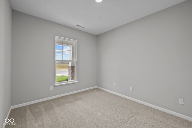 empty room with carpet flooring