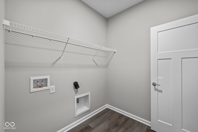 laundry area featuring washer hookup, dark hardwood / wood-style floors, and electric dryer hookup