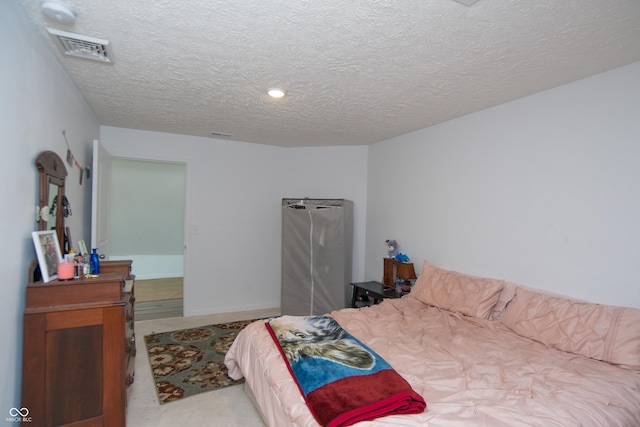 bedroom with a textured ceiling