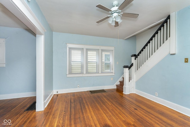 interior space featuring ceiling fan and dark wood-type flooring