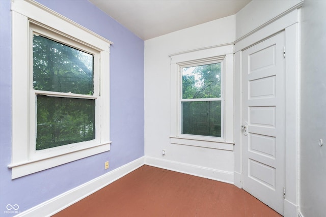 empty room with hardwood / wood-style floors