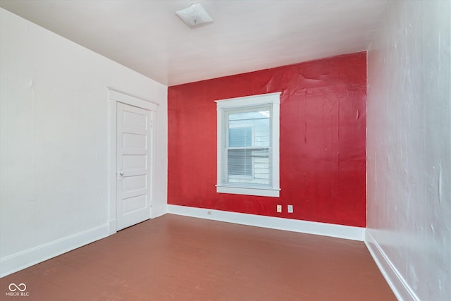 unfurnished room featuring hardwood / wood-style floors