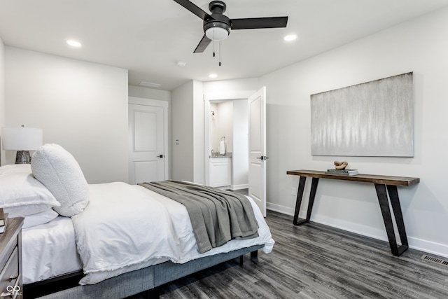 bedroom with visible vents, baseboards, dark wood-style flooring, and recessed lighting