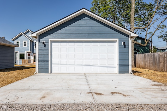 detached garage with fence