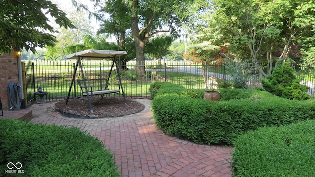 view of property's community with a lawn