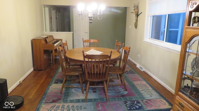 dining room featuring dark hardwood / wood-style flooring