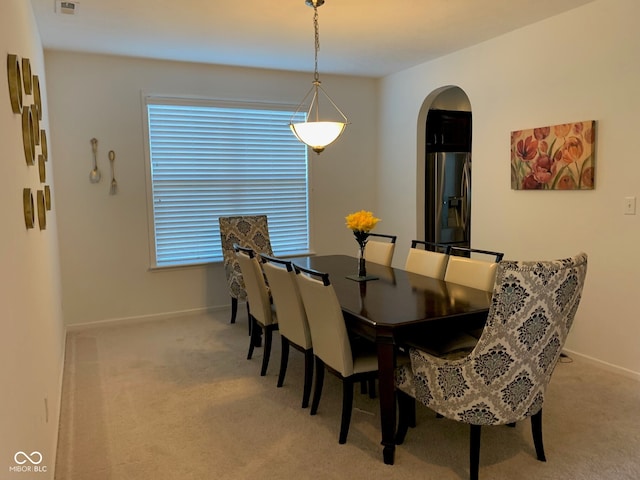 view of carpeted dining room