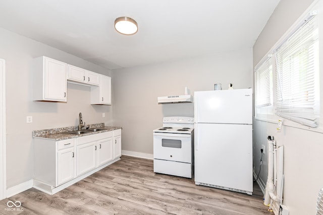 kitchen with sink, white appliances, white cabinets, and light wood-type flooring