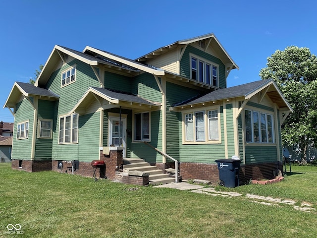 view of front of property with a front lawn