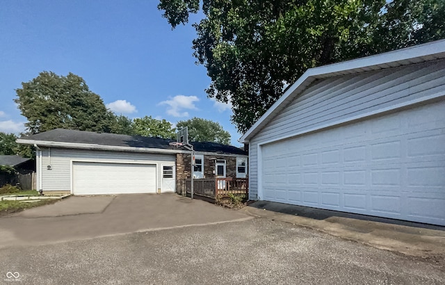 ranch-style house featuring a garage