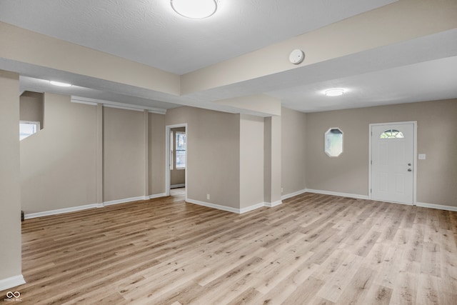 entrance foyer with light wood-type flooring