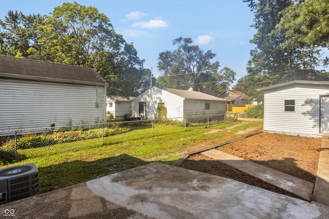 view of yard featuring central AC