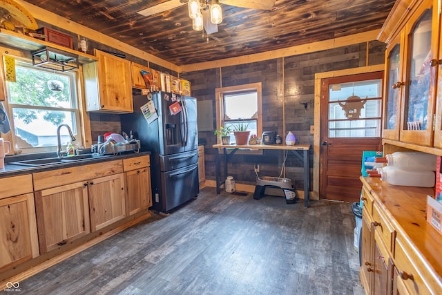 kitchen featuring stainless steel refrigerator with ice dispenser, sink, wooden ceiling, dark hardwood / wood-style flooring, and ceiling fan