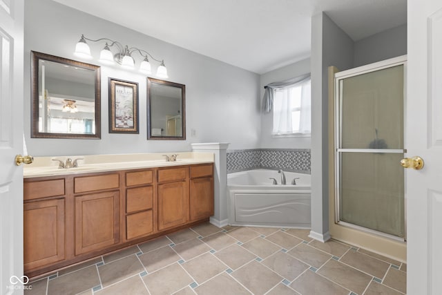 bathroom with independent shower and bath and vanity