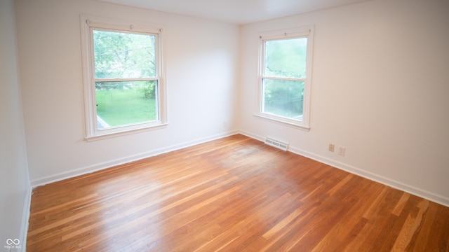 empty room featuring light hardwood / wood-style floors