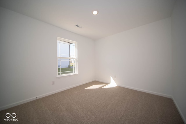 empty room with carpet floors