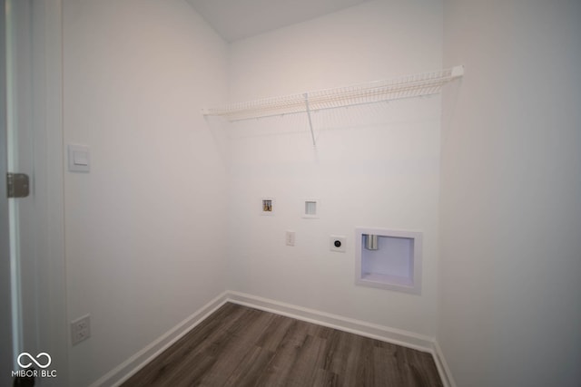 washroom featuring electric dryer hookup, washer hookup, and dark hardwood / wood-style floors