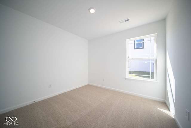 view of carpeted spare room