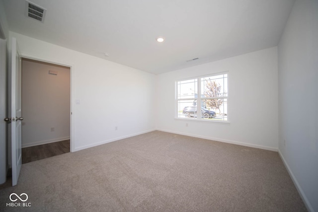 view of carpeted spare room