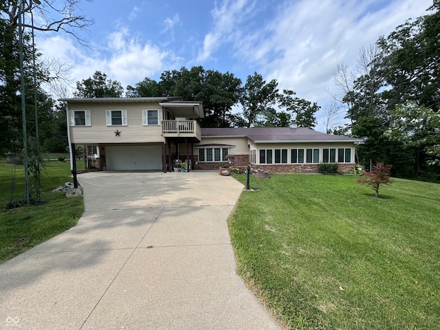 view of front of home with a balcony and a front lawn