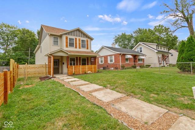 view of front of property with a front yard and a porch