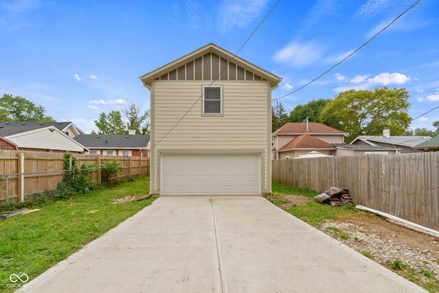 garage featuring a yard