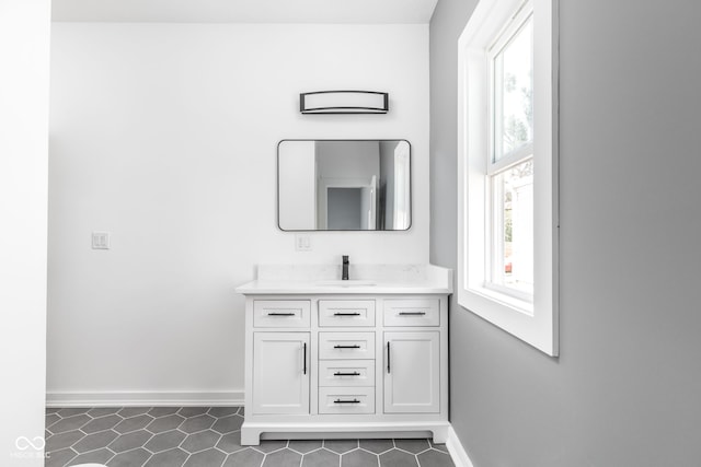 bathroom with vanity and tile patterned floors