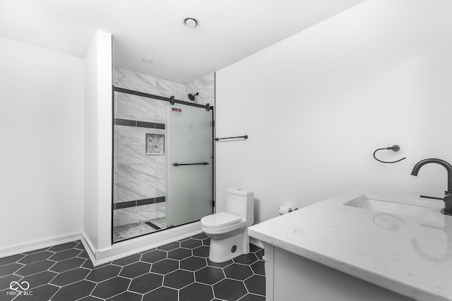 bathroom with vanity, walk in shower, tile patterned flooring, and toilet