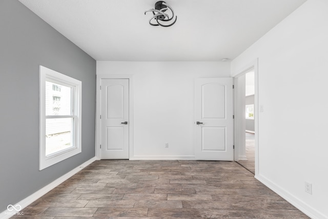 empty room featuring hardwood / wood-style flooring