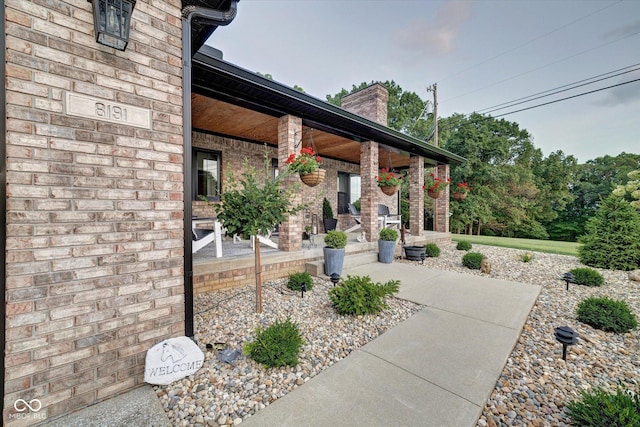 view of patio featuring a porch