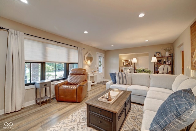 living room with light hardwood / wood-style flooring