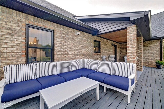 wooden deck featuring an outdoor living space