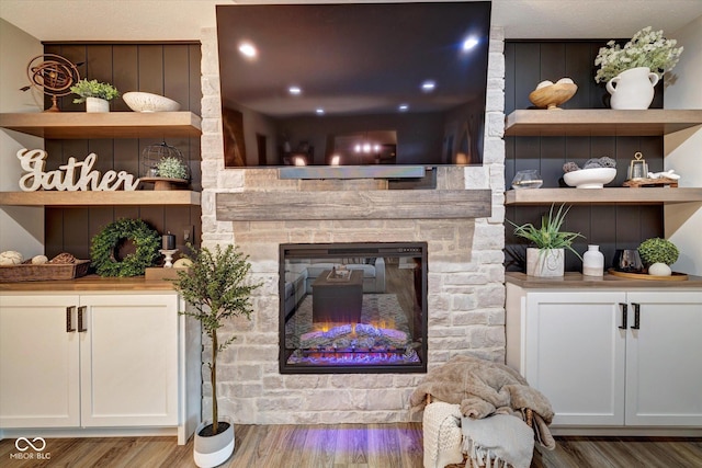 living room featuring hardwood / wood-style floors and a fireplace