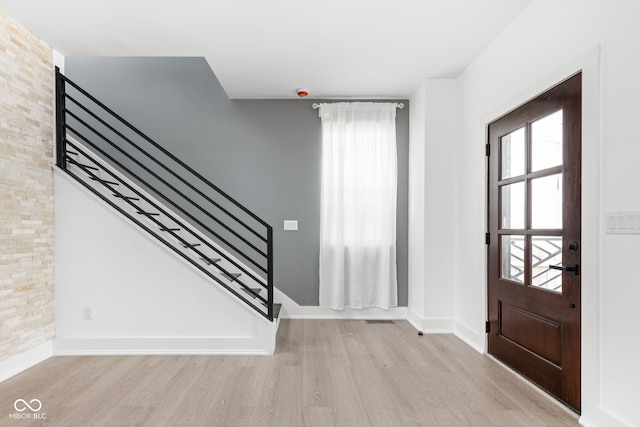 foyer entrance featuring light hardwood / wood-style flooring