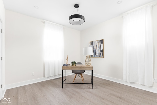 office area featuring light hardwood / wood-style floors