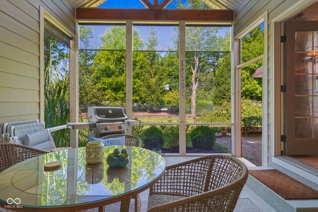 sunroom with vaulted ceiling